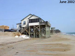 Figure  12.6  Retreat.  (a)  June  2002. Houses along the shore in Kitty Hawk,  North  Carolina.  Geotextile  sand  bags  protect the septic tank buried  in  the  dunes. (b) October 2002. (c) June 2003 [Photo source: © James G. Titus, used with permission].